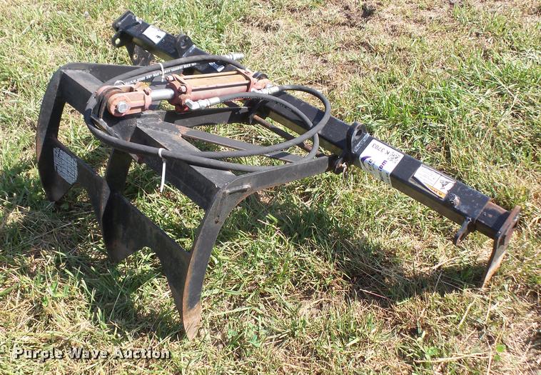 image for item K3703 Skid steer bucket grapple attachment
