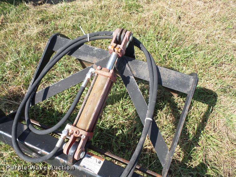 image for item K3703 Skid steer bucket grapple attachment