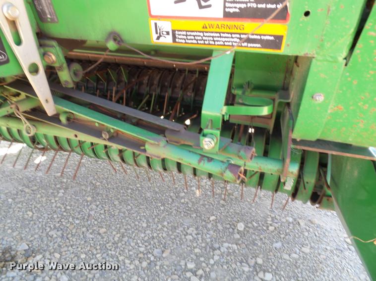 image for item K8202 2003 John Deere 567 Mega Wide round baler