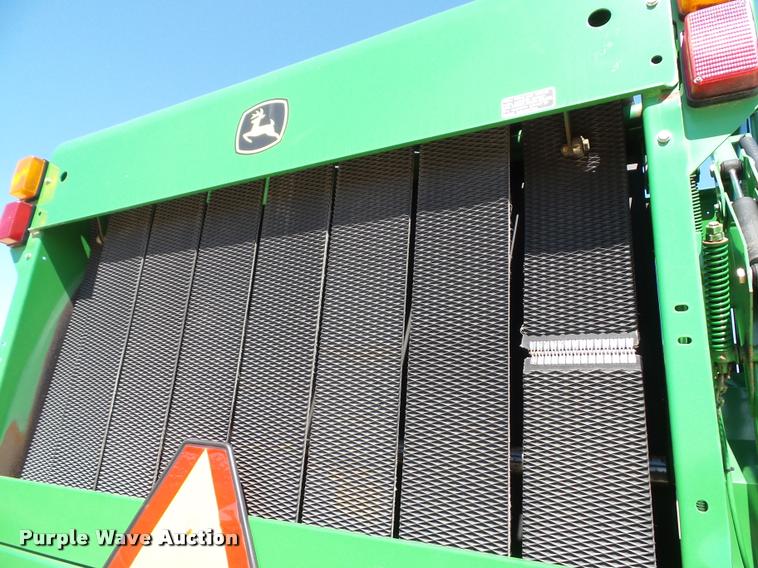 image for item K8202 2003 John Deere 567 Mega Wide round baler