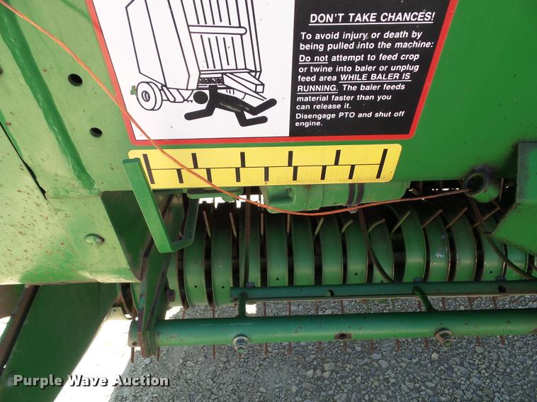 image for item K8202 2003 John Deere 567 Mega Wide round baler