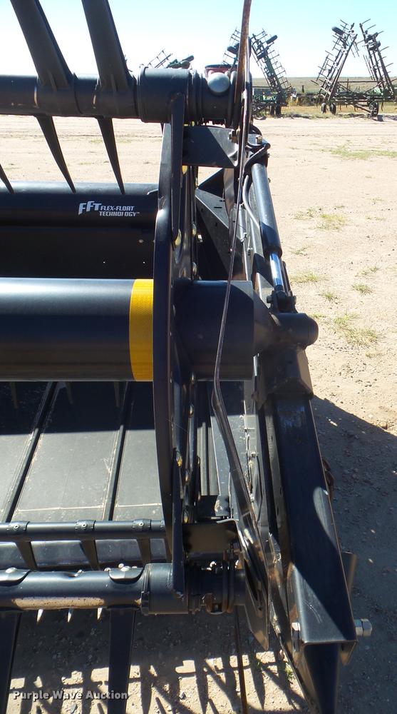 image for item L1667 2014 MacDon FD79 draper flex head