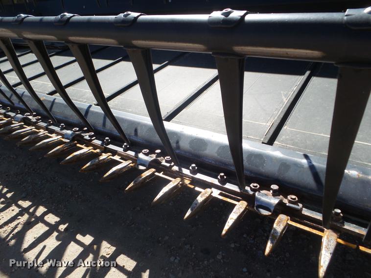 image for item L1667 2014 MacDon FD79 draper flex head