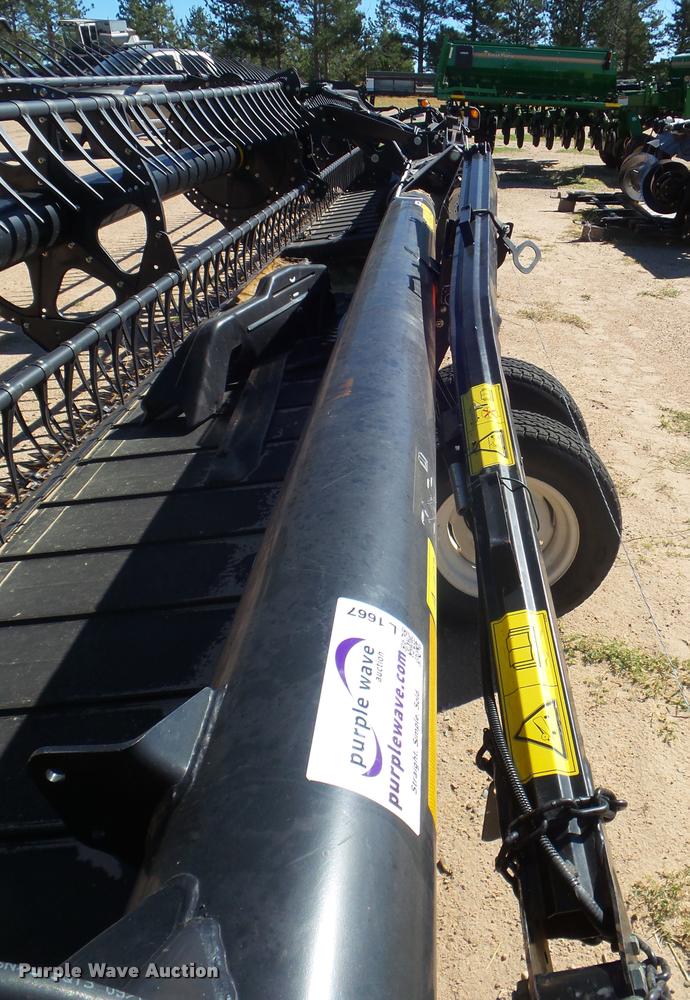 image for item L1667 2014 MacDon FD79 draper flex head