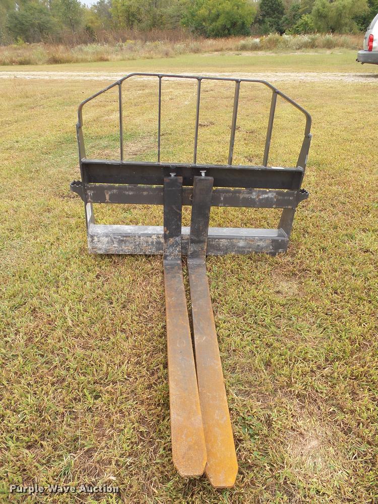 image for item BV9374 New Holland skid steer forks