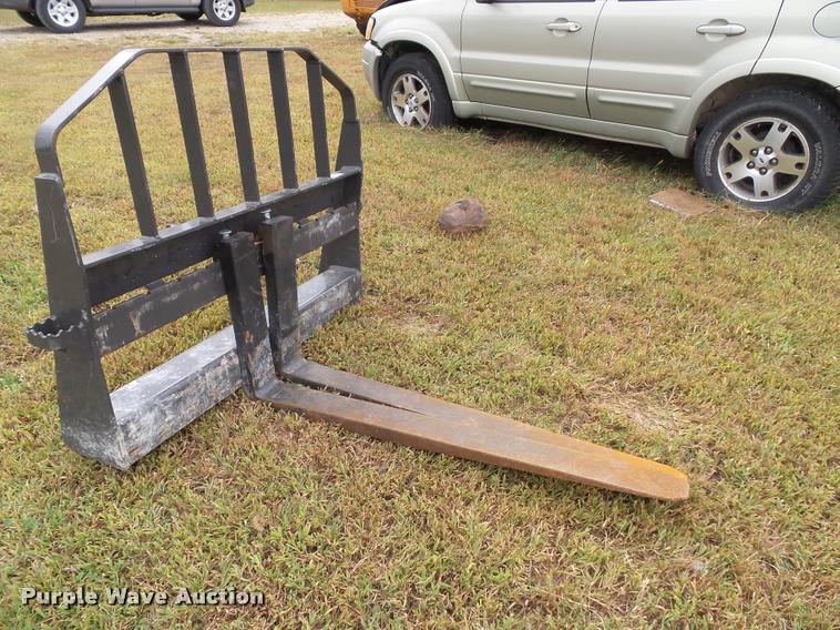 image for item BV9374 New Holland skid steer forks