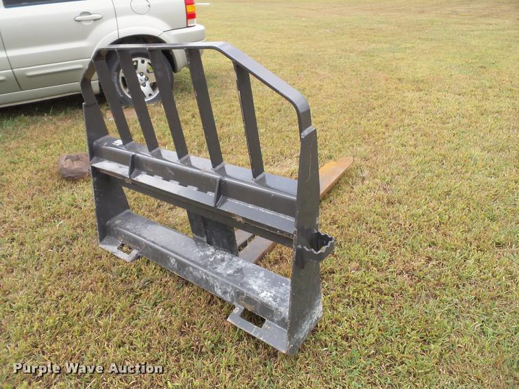 image for item BV9374 New Holland skid steer forks