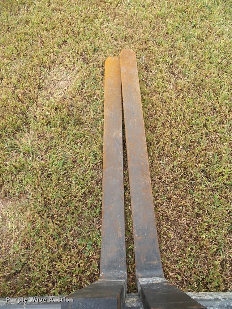 image for item BV9374 New Holland skid steer forks