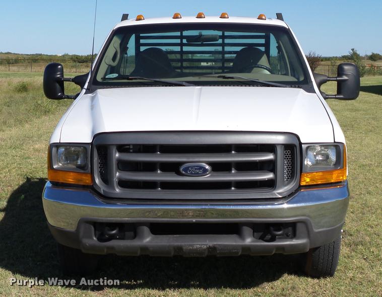 image for item DB4557 1999 Ford F350 Super Duty flatbed pickup truck