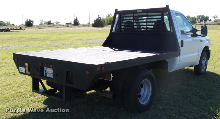 image for item DB4557 1999 Ford F350 Super Duty flatbed pickup truck
