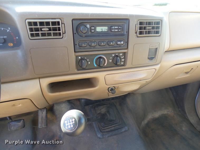 image for item DB4557 1999 Ford F350 Super Duty flatbed pickup truck