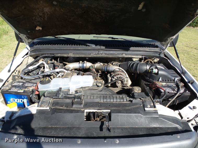 image for item DB4557 1999 Ford F350 Super Duty flatbed pickup truck