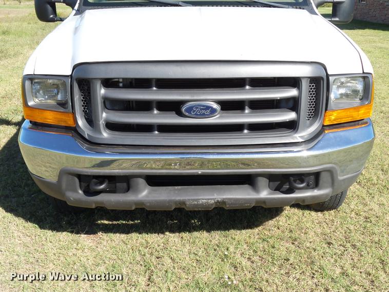 image for item DB4557 1999 Ford F350 Super Duty flatbed pickup truck