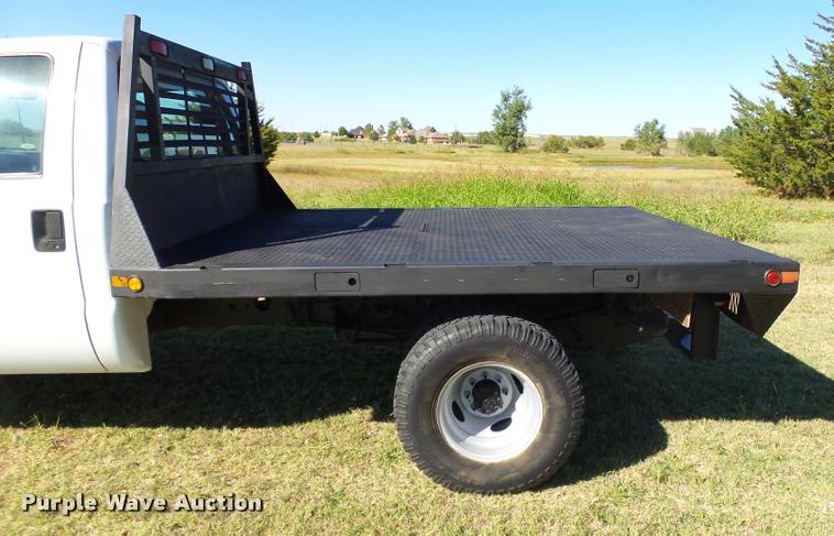 image for item DB4557 1999 Ford F350 Super Duty flatbed pickup truck