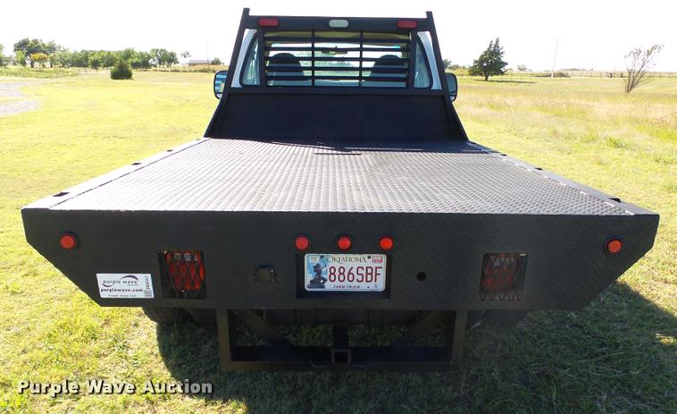 image for item DB4557 1999 Ford F350 Super Duty flatbed pickup truck