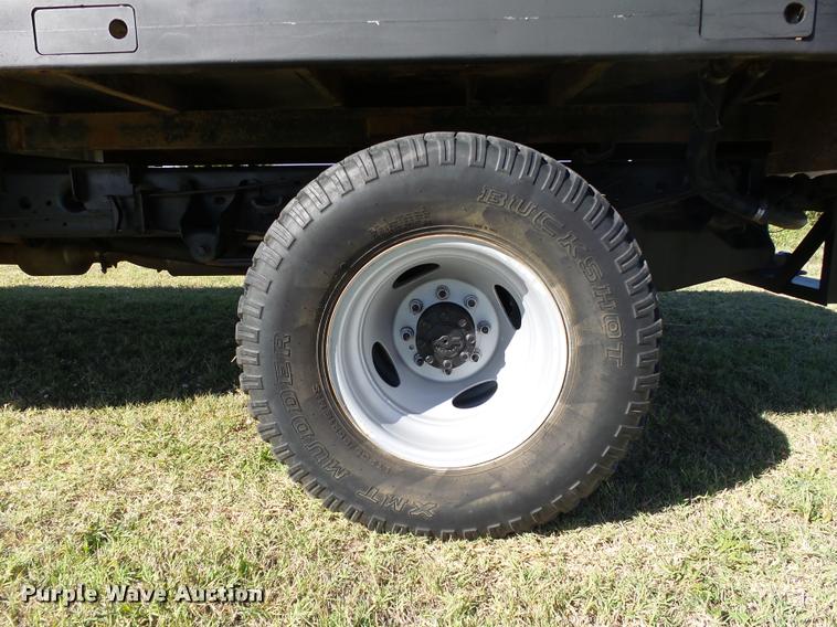 image for item DB4557 1999 Ford F350 Super Duty flatbed pickup truck