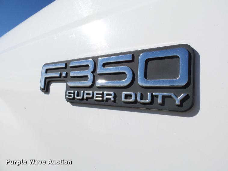 image for item DB4557 1999 Ford F350 Super Duty flatbed pickup truck