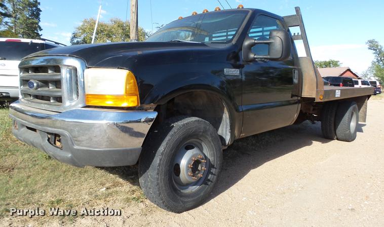 image for item L4079 1999 Ford F350 Super Duty flatbed pickup truck