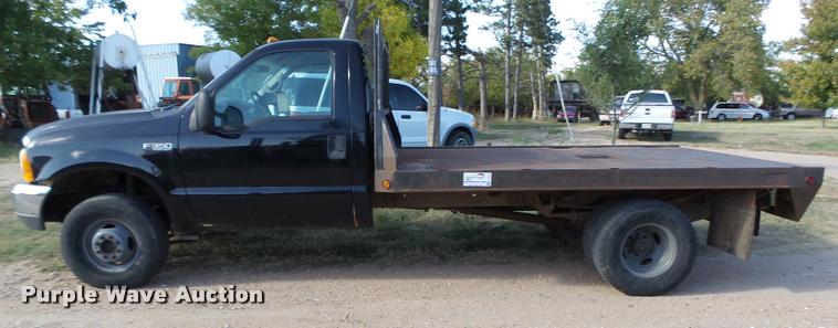 image for item L4079 1999 Ford F350 Super Duty flatbed pickup truck