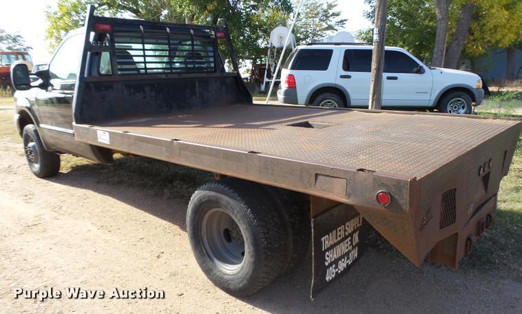image for item L4079 1999 Ford F350 Super Duty flatbed pickup truck
