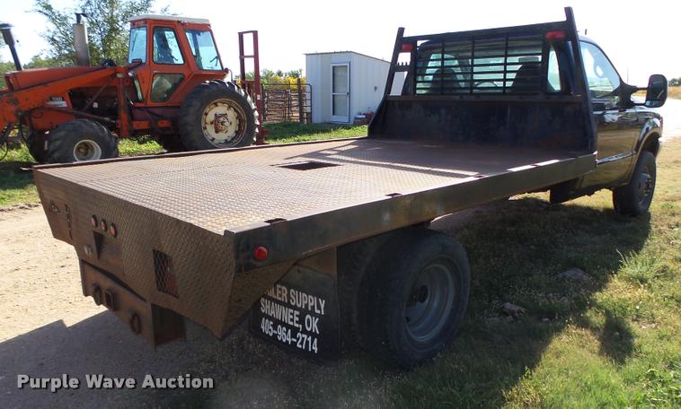 image for item L4079 1999 Ford F350 Super Duty flatbed pickup truck