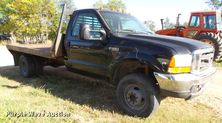 image for item L4079 1999 Ford F350 Super Duty flatbed pickup truck