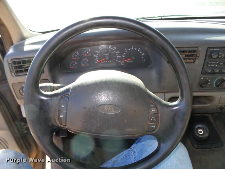 image for item L4079 1999 Ford F350 Super Duty flatbed pickup truck