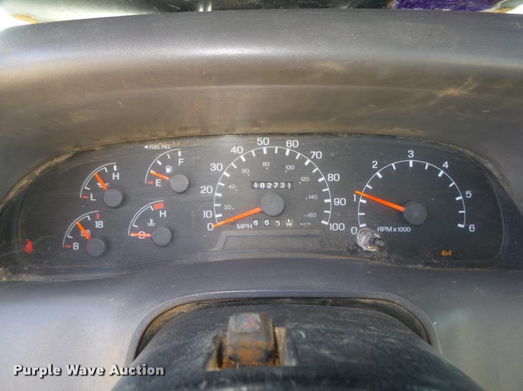 image for item L4079 1999 Ford F350 Super Duty flatbed pickup truck