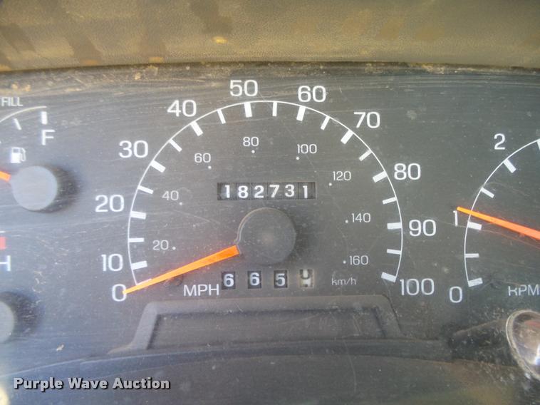 image for item L4079 1999 Ford F350 Super Duty flatbed pickup truck