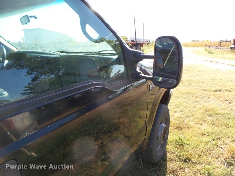 image for item L4079 1999 Ford F350 Super Duty flatbed pickup truck