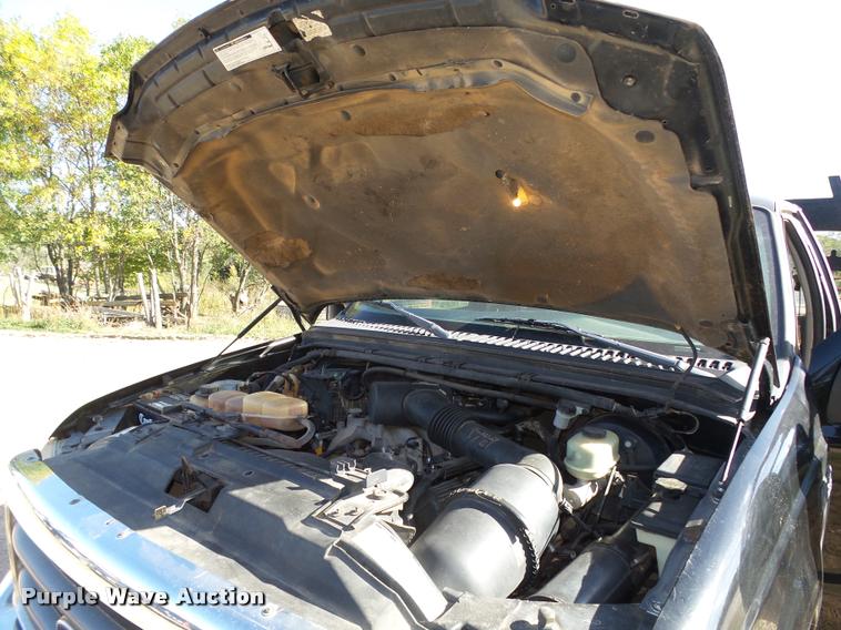 image for item L4079 1999 Ford F350 Super Duty flatbed pickup truck