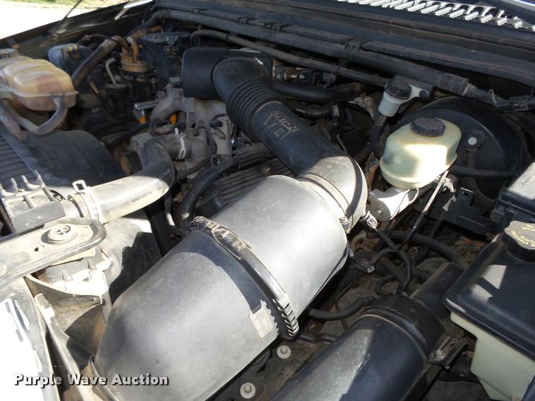 image for item L4079 1999 Ford F350 Super Duty flatbed pickup truck