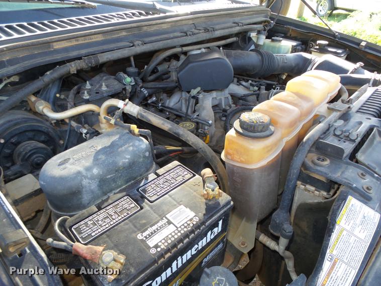 image for item L4079 1999 Ford F350 Super Duty flatbed pickup truck