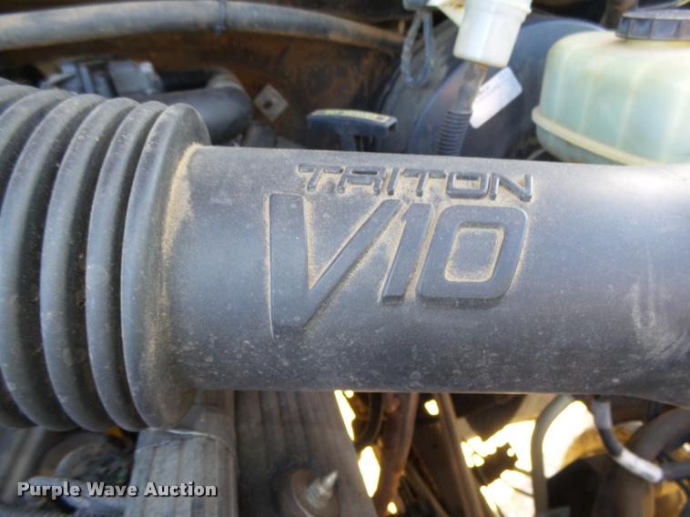 image for item L4079 1999 Ford F350 Super Duty flatbed pickup truck