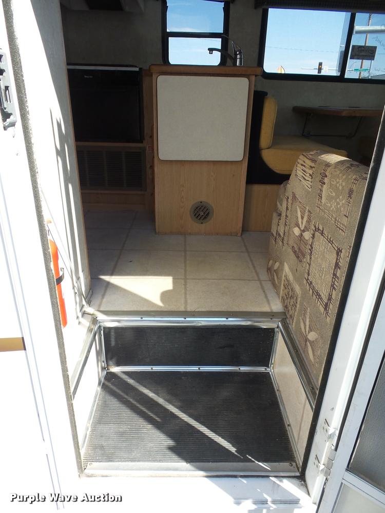 image for item L4252 2003 Ford Econoline E450 Super Duty Forest River Sunseeker RV