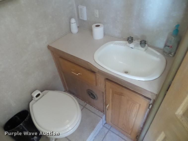 image for item L4252 2003 Ford Econoline E450 Super Duty Forest River Sunseeker RV