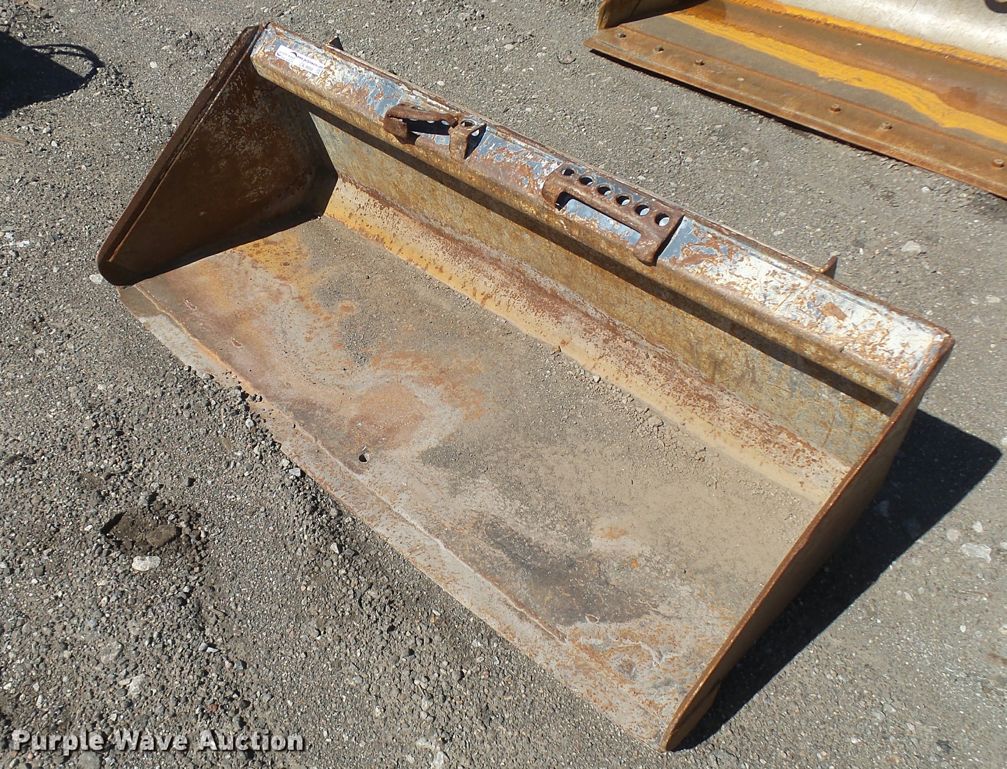 Skid steer bucket in Wichita, KS Item CA9959 sold Purple Wave