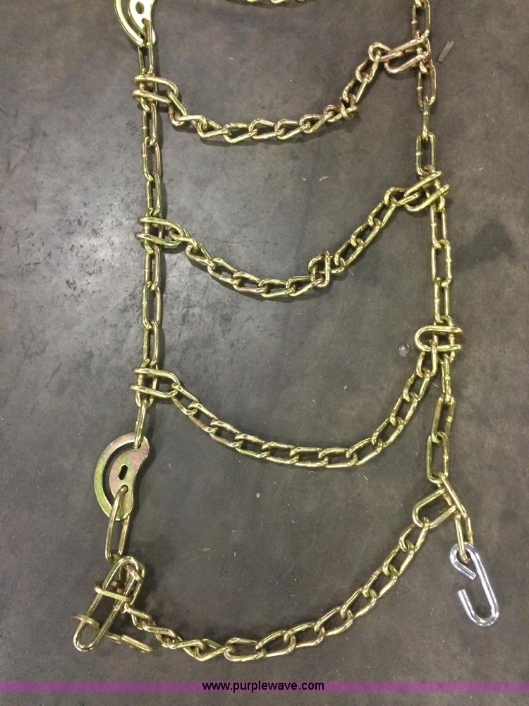 image for item F1231 (4) Case 12x16.5 hardened skid steer tire chains