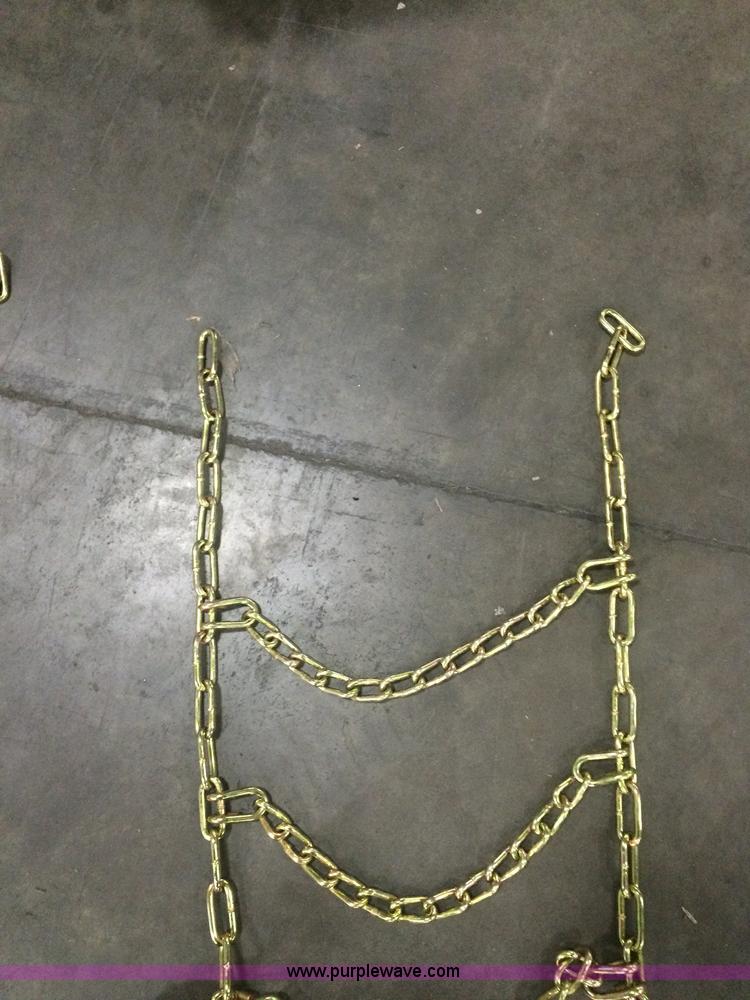 image for item F1231 (4) Case 12x16.5 hardened skid steer tire chains