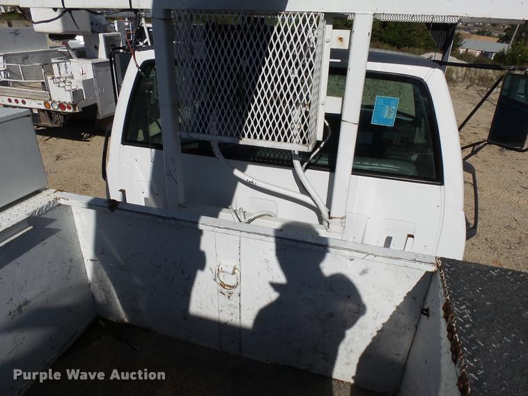 image for item K1092 1999 GMC C7500 bucket truck