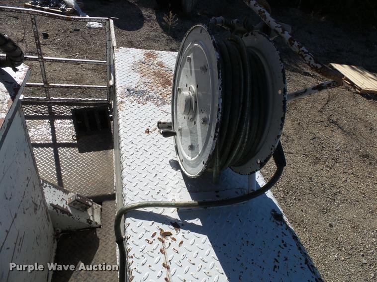 image for item K1092 1999 GMC C7500 bucket truck