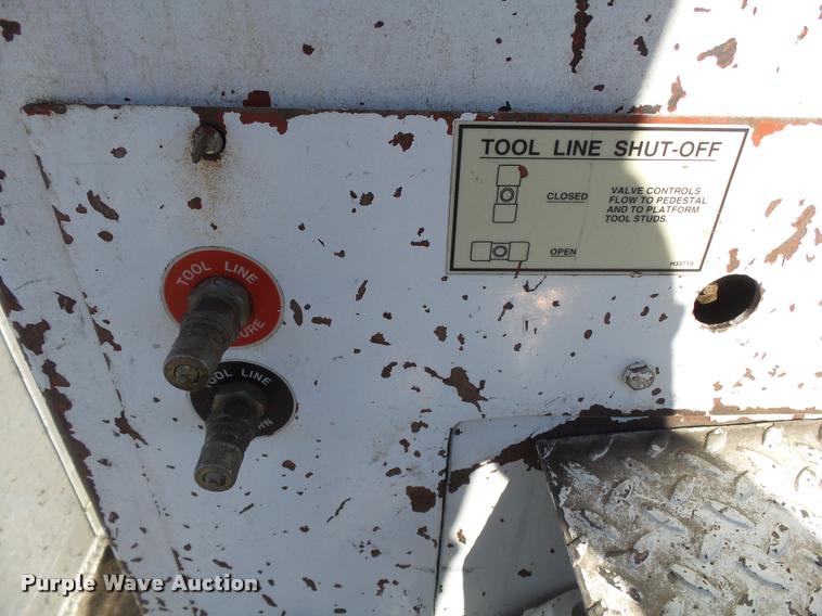 image for item K1092 1999 GMC C7500 bucket truck