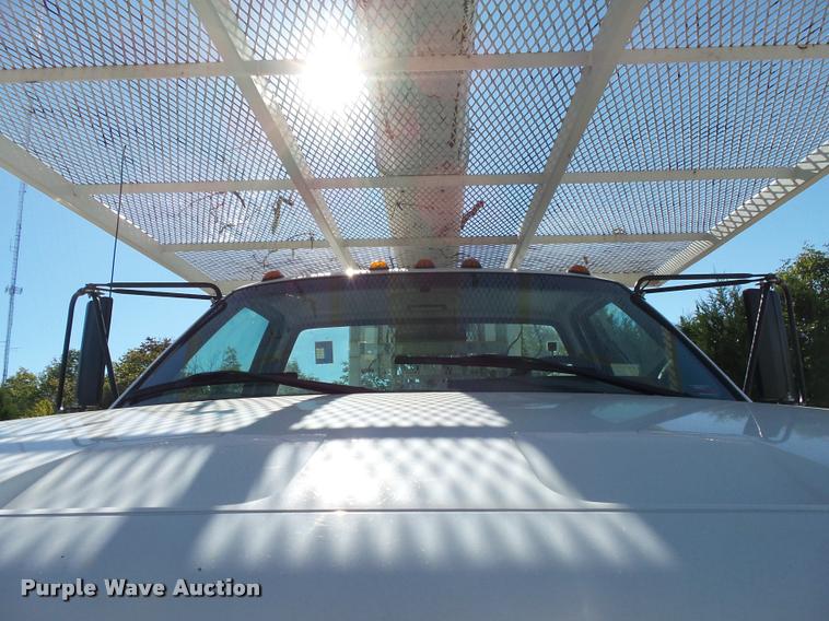 image for item K1092 1999 GMC C7500 bucket truck