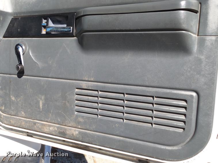 image for item K1092 1999 GMC C7500 bucket truck