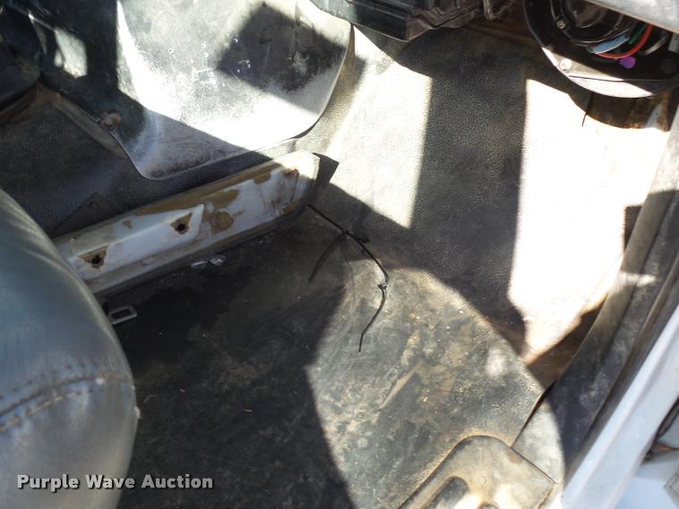 image for item K1092 1999 GMC C7500 bucket truck