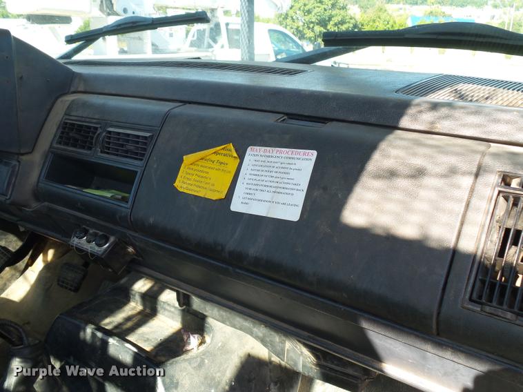 image for item K1092 1999 GMC C7500 bucket truck