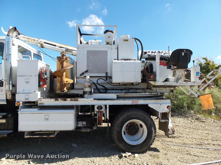 image for item K1093 2000 Freightliner FL80 pressure digger truck