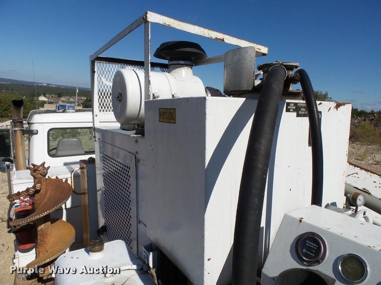 image for item K1093 2000 Freightliner FL80 pressure digger truck