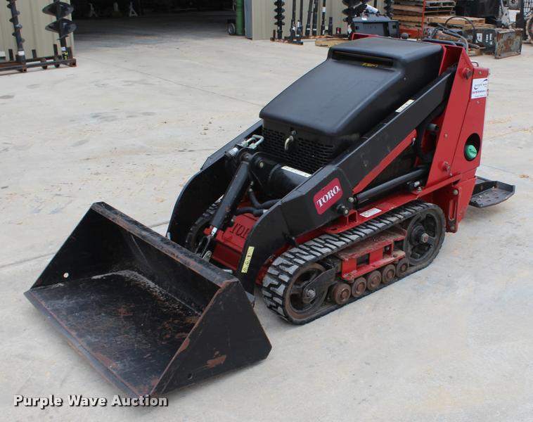 image for item K1944 Toro Dingo walk behind skid steer