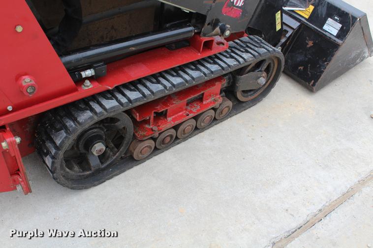 image for item K1944 Toro Dingo walk behind skid steer